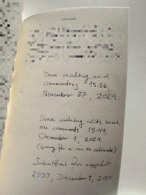 The last page of the final draft, with the prose blurred and John's notes on when he finished reading it and when he finished editing it.